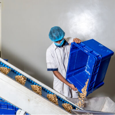 Workers in manufacturing process at Keells Food Products PLC